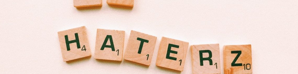 white and brown wooden letter blocks